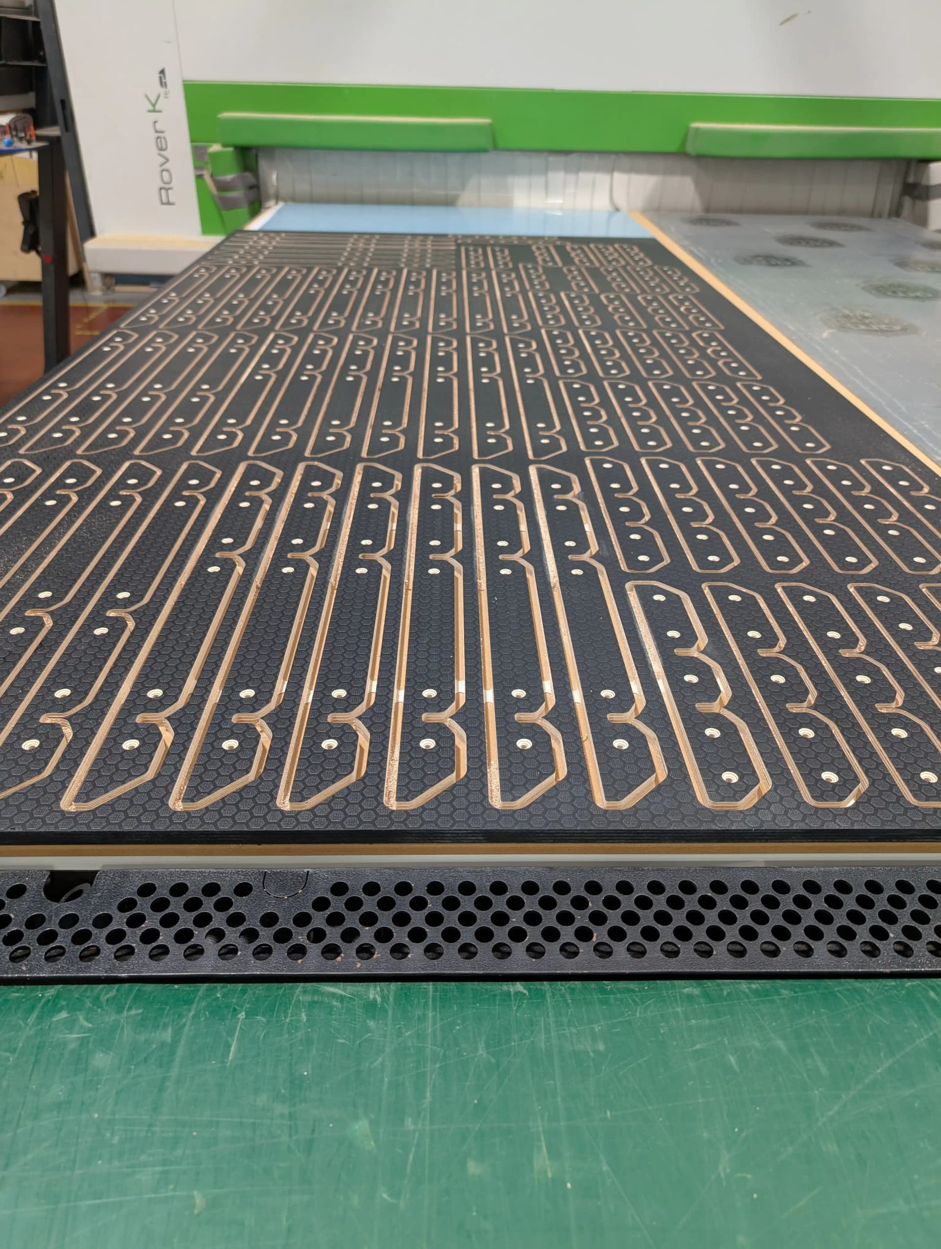 CNC nesting layout on black laminate board